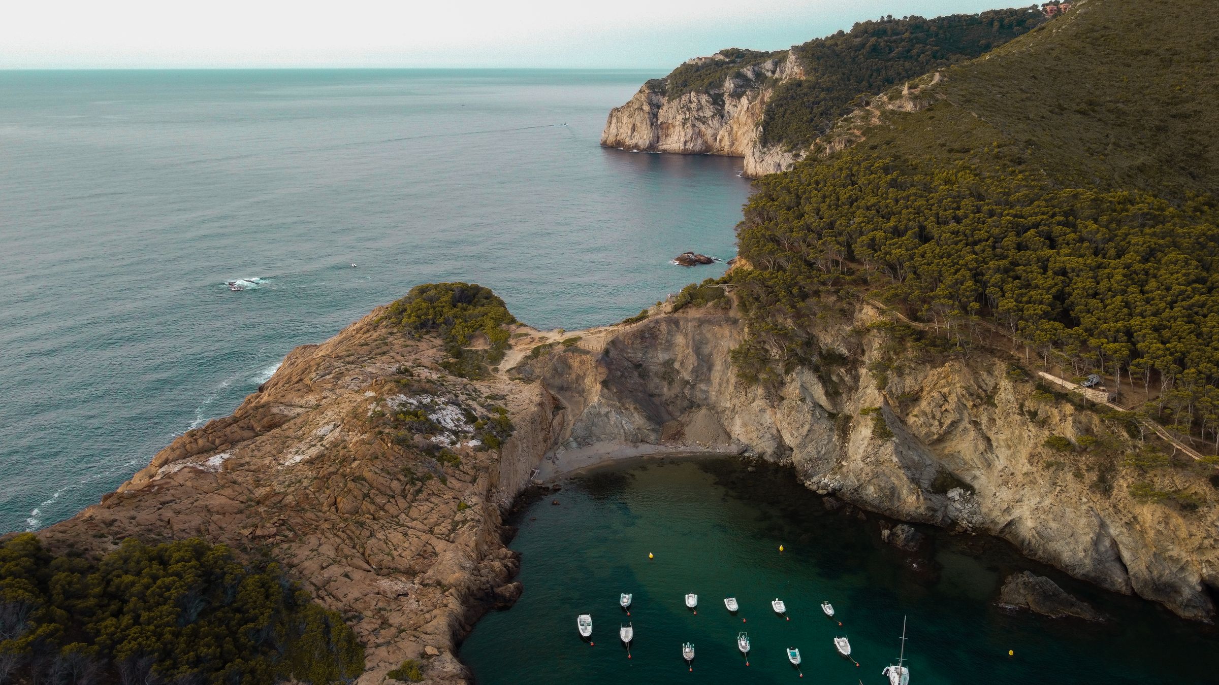 Aerial view of the rocky Sa Tuna cove on the Costa Brava